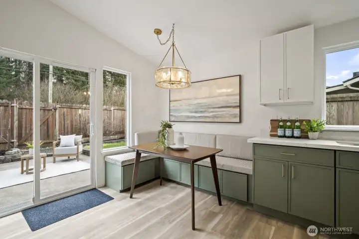 Clever built-in seating creates a cozy breakfast nook, perfect for casual mornings or intimate family meals