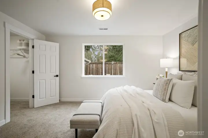 Another view of the primary bedroom