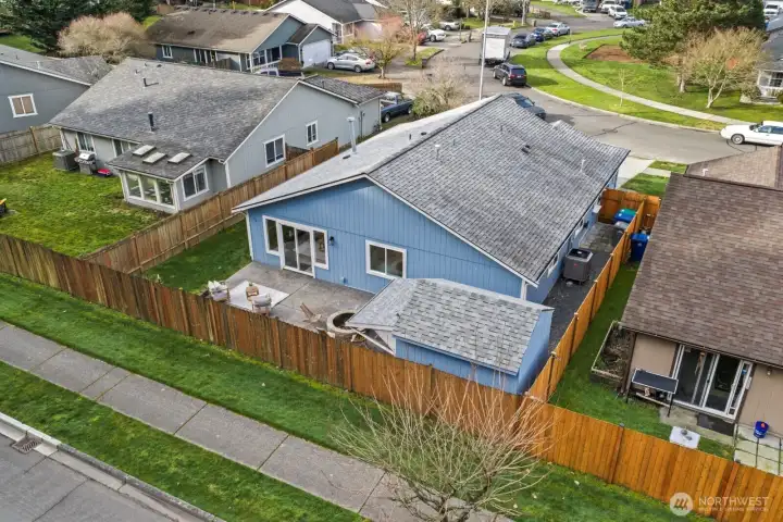 Bird's-eye view highlights fully fenced yard, patio, and outdoor perks