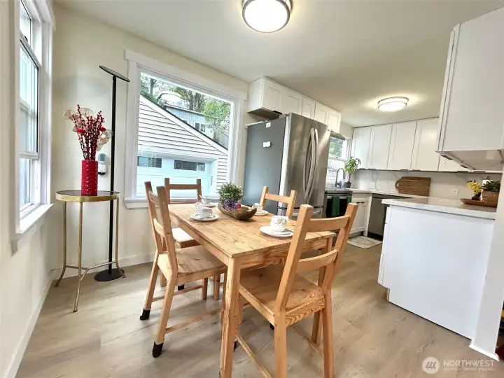 dining room and kitchen and view to garage