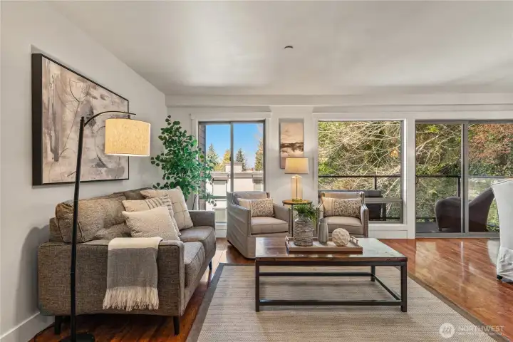 Gorgeous, freshly painted open-concept interiors and large windows bring   natural light right in!