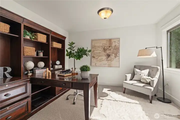 The spacious den has endless opportunities for a custom office or convert to a 4th bedroom if needed!