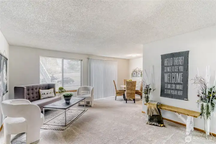 Spacious living room with fresh interior paint & New carpet!