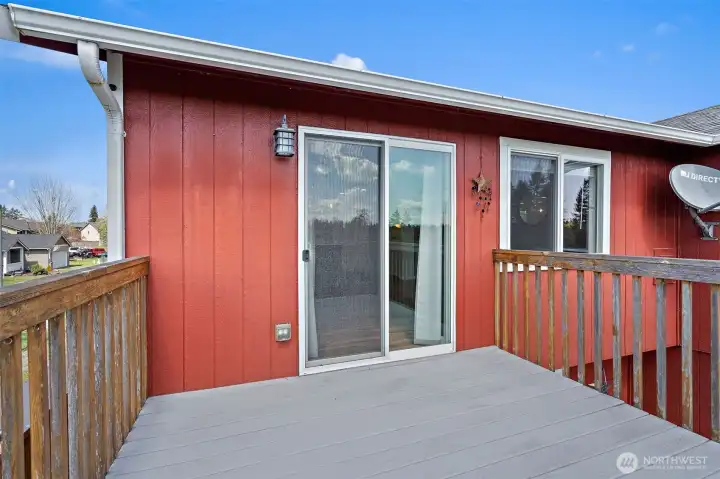 2nd story deck enter into the living room and Kitchen
