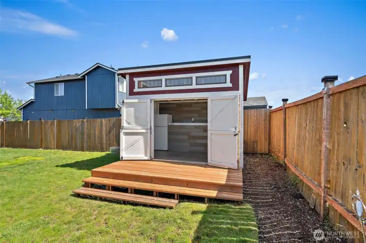 Man-Cave or She-shed with power and fridge stays.