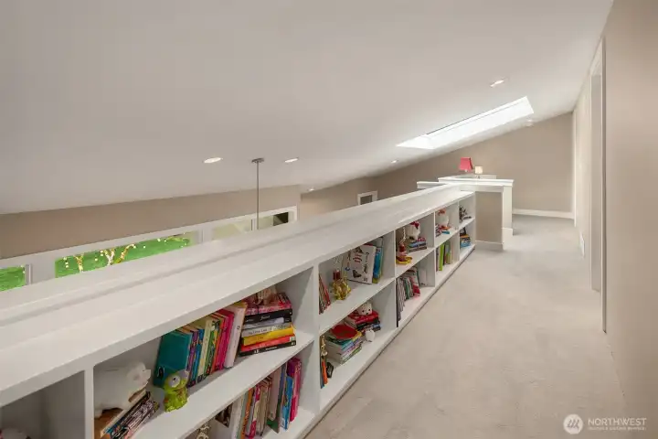 Built-in Shelving on upper level overlooking Living/Dining rooms