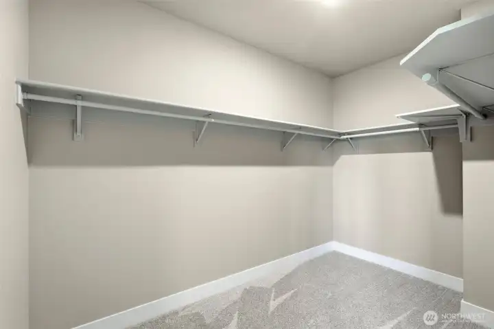 Primary walk in closet Primary walk in closet