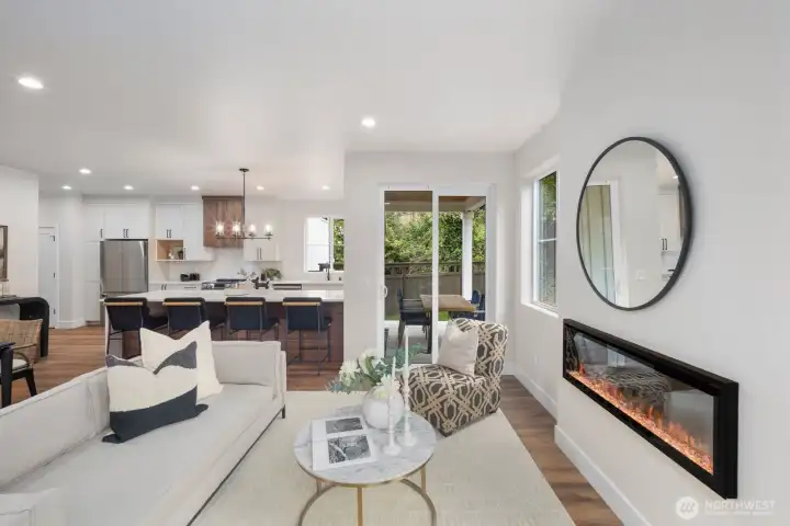 Sliding glass doors off of the living room leading to the outdoor entertaining space. Sliding glass doors off of the living room leading to the outdoor entertaining space.
