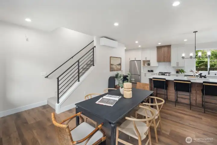 Convenient everyday living on the floor with open concept. Metal open rail - railings on staircase leading to the second floor. Convenient everyday living on the floor with open concept. Metal open rail - railings on staircase leading to the second floor.