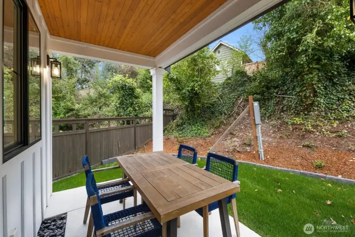 Outdoor patio space. (Please note the electric meter on pole is temporary and will be relocated.) Outdoor patio space. (Please note the electric meter on pole is temporary and will be relocated.)