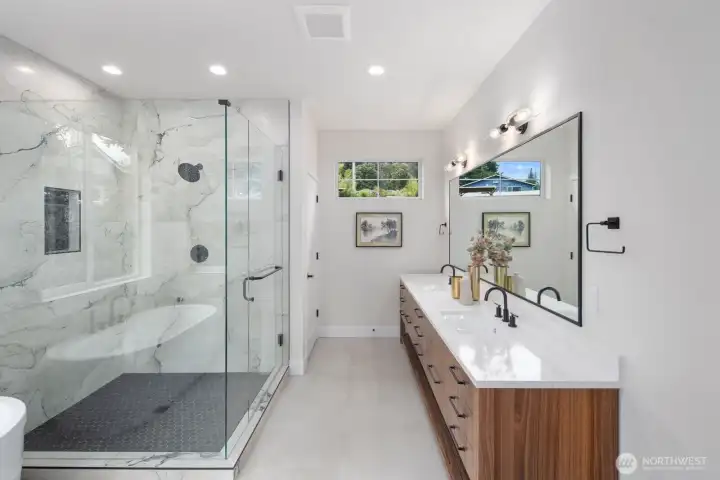 Master bath offers two sinks with plenty of counter space and a lot of storage space with all of the bathroom cabinet drawers. The door at the end offers privacy to the toilet area. Oversized shower is a must! Master bath offers two sinks with plenty of counter space and a lot of storage space with all of the bathroom cabinet drawers. The door at the end offers privacy to the toilet area. Oversized shower is a must!