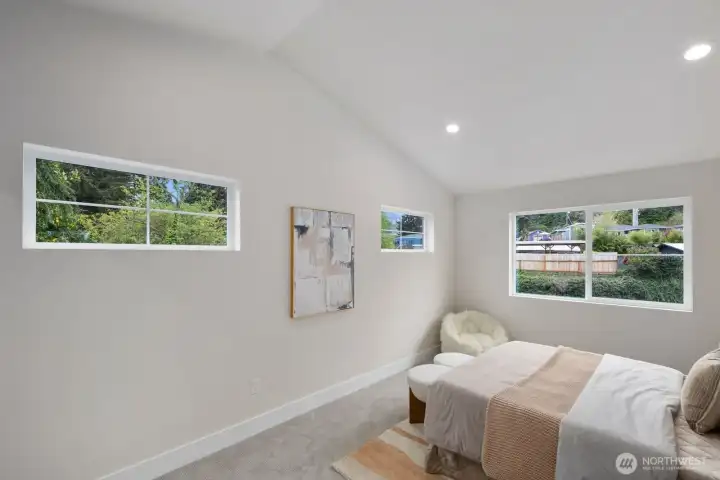 Third floor guest bedroom #4 with vaulted ceiling. Third floor guest bedroom #4 with vaulted ceiling.