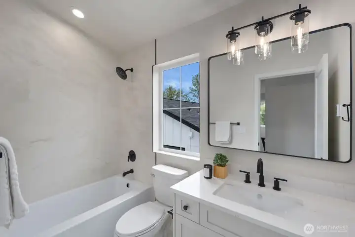 Third floor guest bathroom with tub/shower combo. Third floor guest bathroom with tub/shower combo.