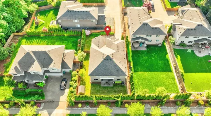 Drone view of house from the back. Drone view of house from the back.