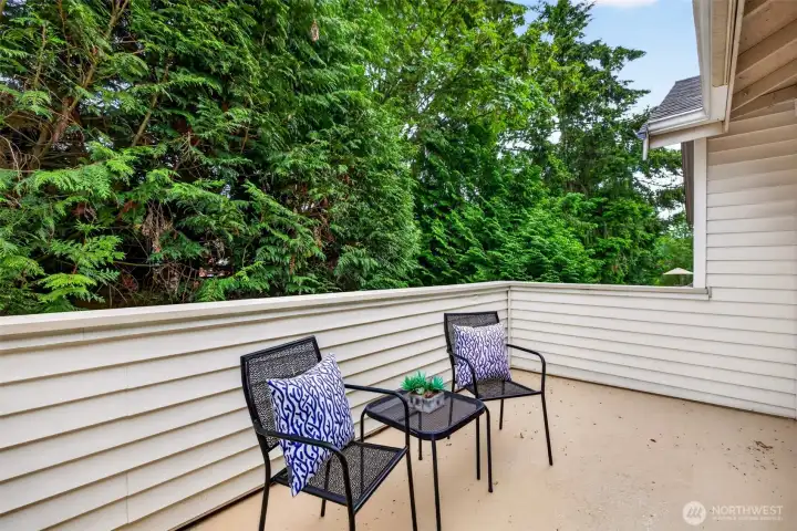 Wrapped in towering greenery, the deck offers a serene, tucked-away spot to relax and enjoy fresh Pacific Northwest air. Its generous size leaves plenty of room to lounge, entertain, or simply take in the surroundings.