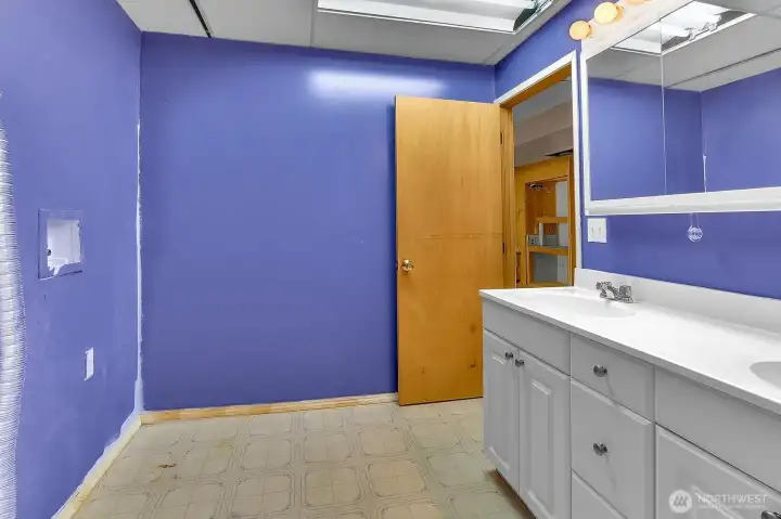 Laundry room with a double vanity. This space is already plumbed for a 3/4 bath - just waiting for you to put the finishing touches on it. Laundry room with a double vanity. This space is already plumbed for a 3/4 bath - just waiting for you to put the finishing touches on it.