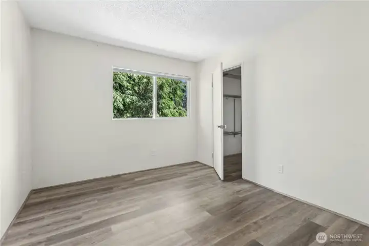 Primary bedroom with walk in closet Primary bedroom with walk in closet