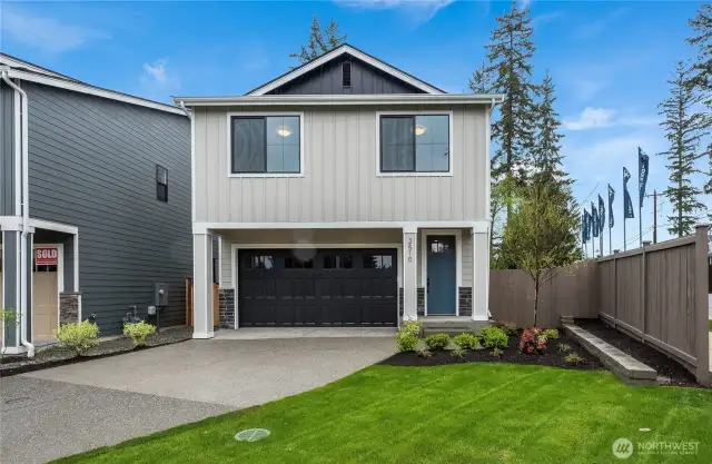 Plan 1907 Elevation A - photo of a home built at another community.  Lot & details will vary.