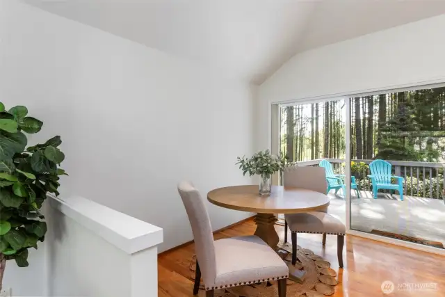 More informal dining area, slider to back deck/yard.