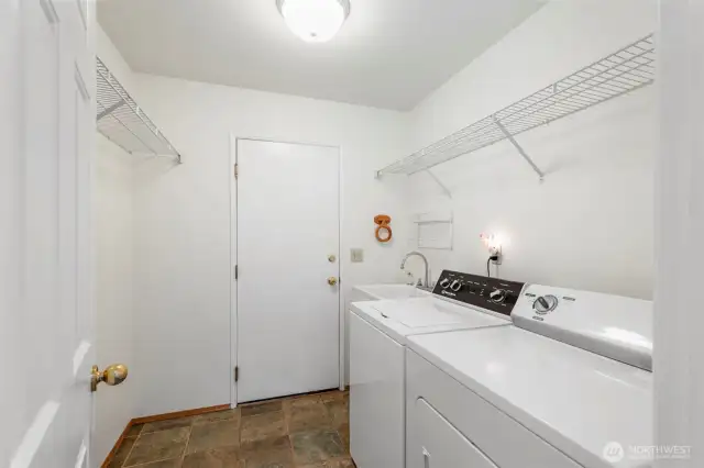 Laundry room, right off the garage is a very convenient location.