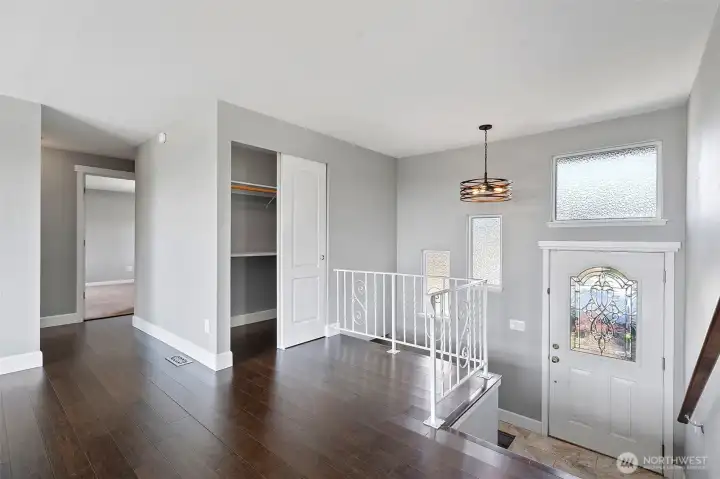 Entry way, hallway closet, secondary Laundry