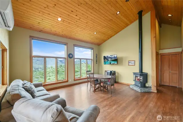 Large picture windows showcase sweeping mountain and valley views.  Ductless mini-split system offers quiet and efficient heating/cooling.