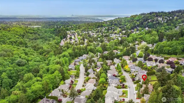 Drone shot with house location in relation to City of Seattle