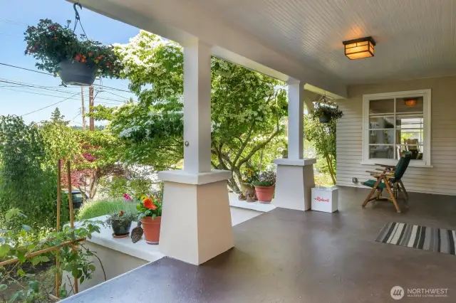 What a beautiful front porch to relax with a cup of morning joe.