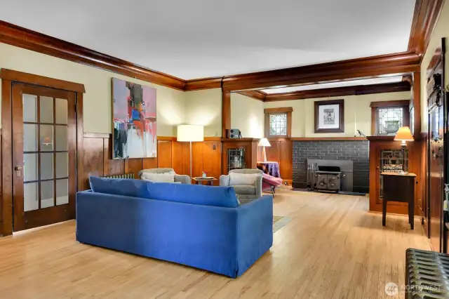 Note the high ceilings oak floors and leaded glass built-ins