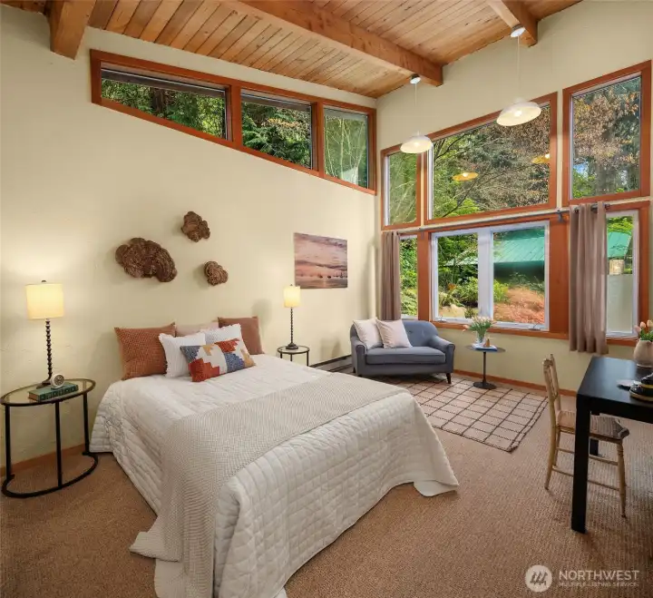 The primary has high ceilings and a cozy feel.