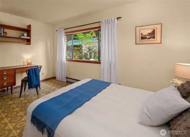 2nd bedroom with views of the yard.