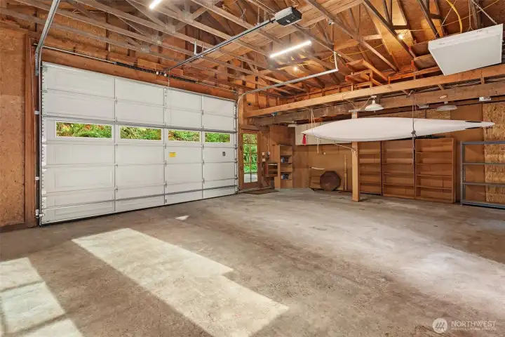 Large 2-car garage with shop space.