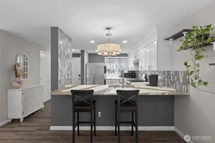 Modern lighting over kitchen area