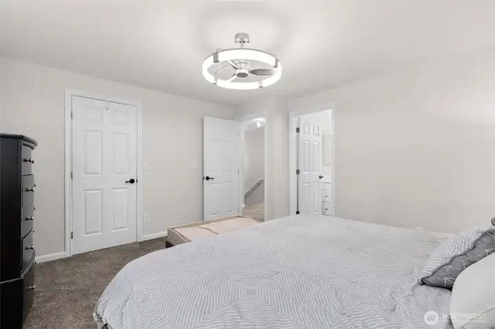 Primary bedroom with walk in closet