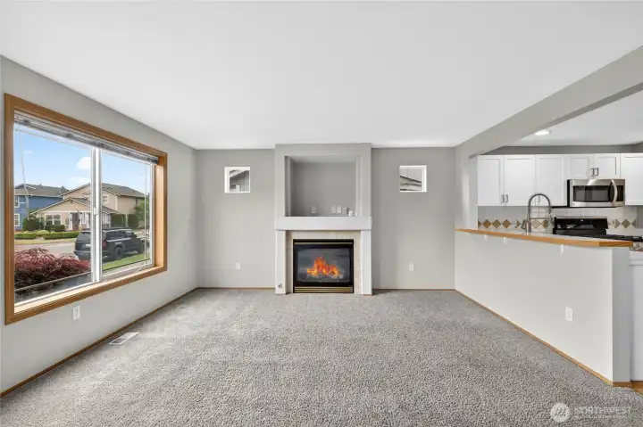 Corner gas fireplace with media niche