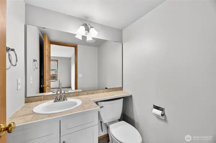 ½ BATH with single vanity and tile floors