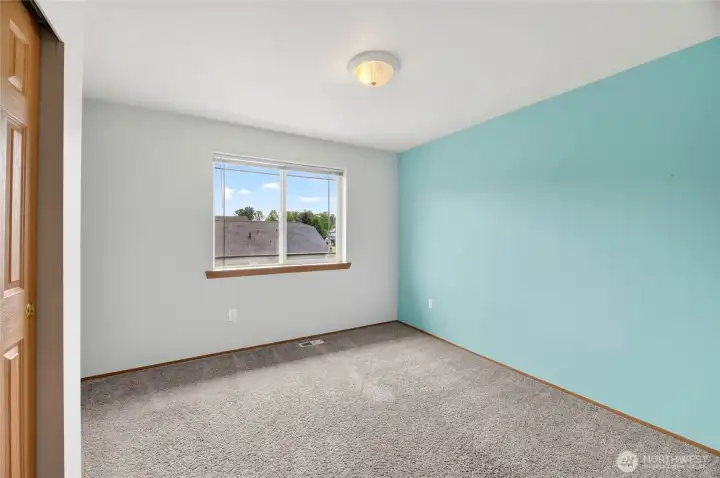 BEDROOM #2 with walk in closet and window facing rear yard