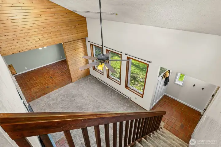 View of living area from top of the stairs