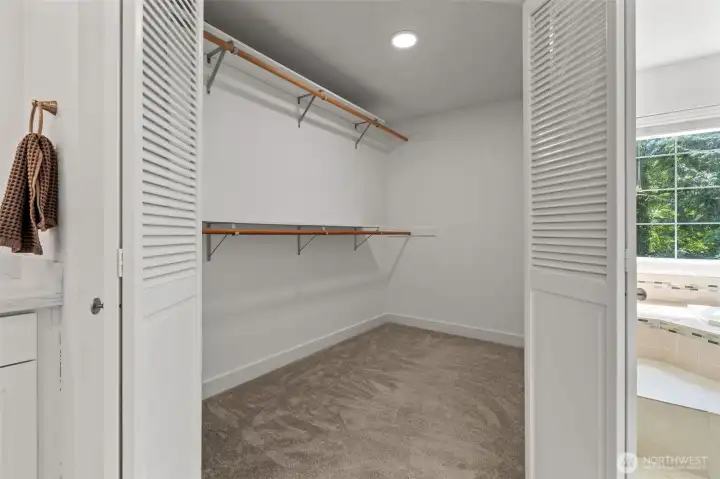Primary's Oversized Walk in Closet Primary's Oversized Walk in Closet