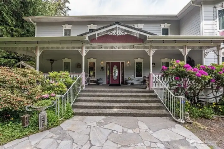 Expansive covered front porch is a welcoming arrival for guests.