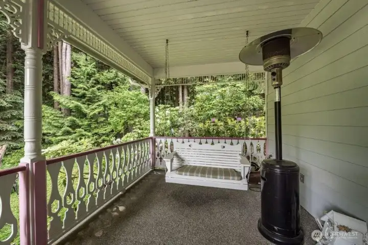 The front porch is perfect for afternoon tea or your favorite beverage.
