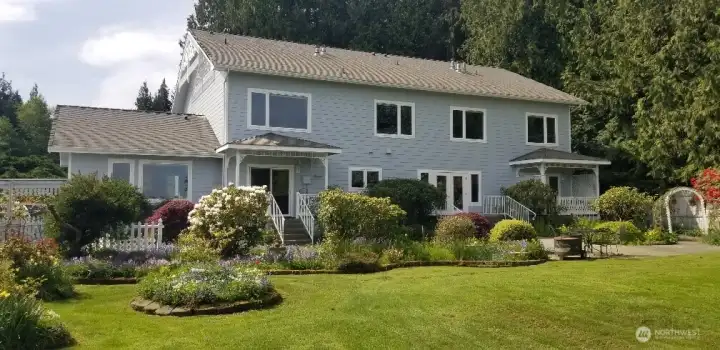 Thoughtfully designed grounds create a memorable first impression.