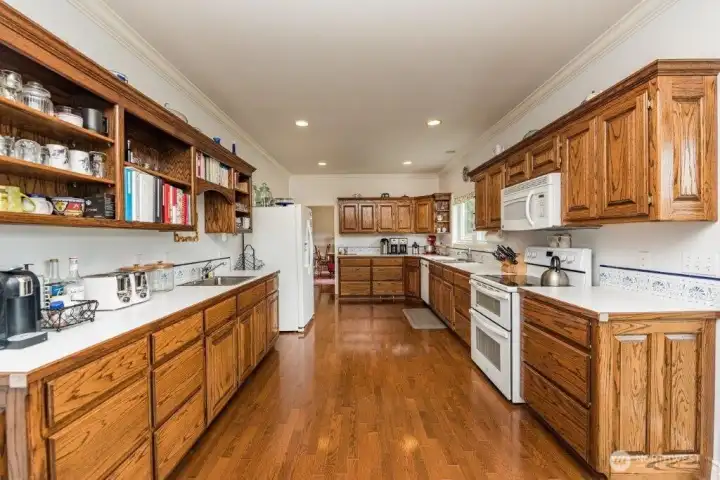 Spacious B & B kitchen with abundant cabinetry and prep space for effortless meal preparation.