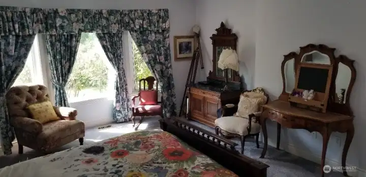 Another view of the main floor bedroom with relaxing views.