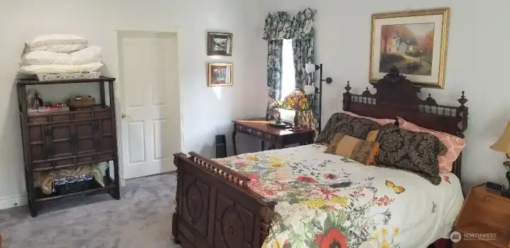 Another view of the main floor bedroom with a new bath.