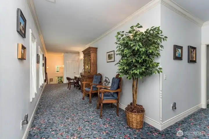 Upstairs hall with a convenient sitting area.