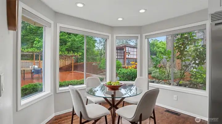 Bright breakfast nook offers the perfect spot for casual dining, morning coffee, or everyday gathering.