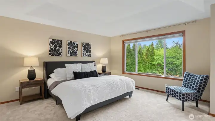 Retreat to the primary bedroom with an ensuite 5 piece bath and walk-in closet.