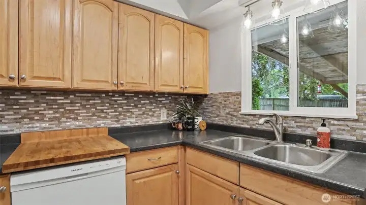 A functional butcherblock countertop over the dishwasher, A functional butcherblock countertop over the dishwasher,