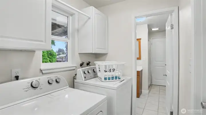 Enjoy a dedicated laundry room. The washer and dryer remain with the residence. Enjoy a dedicated laundry room. The washer and dryer remain with the residence.